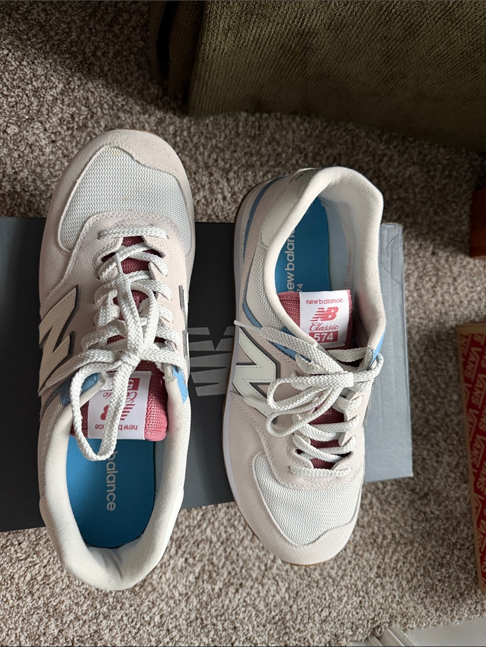 New Balance White Sneakers with pink/reddish Tongue and Blue Insole.